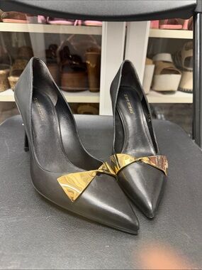 Stewart Weitzman Black Pointed Toe Pumps with Gold Bow